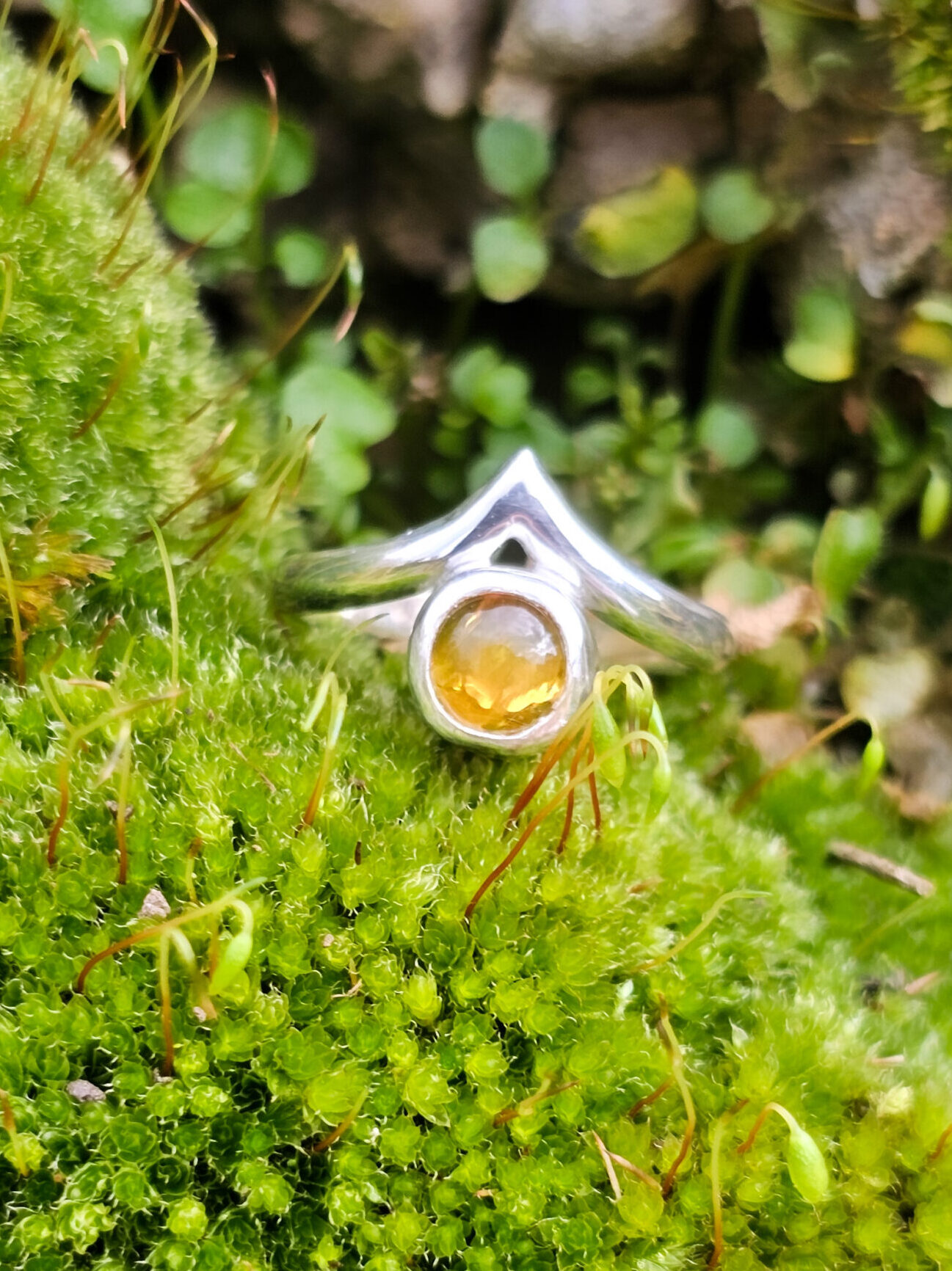 Bague en argent sertie d'une Opale de feu